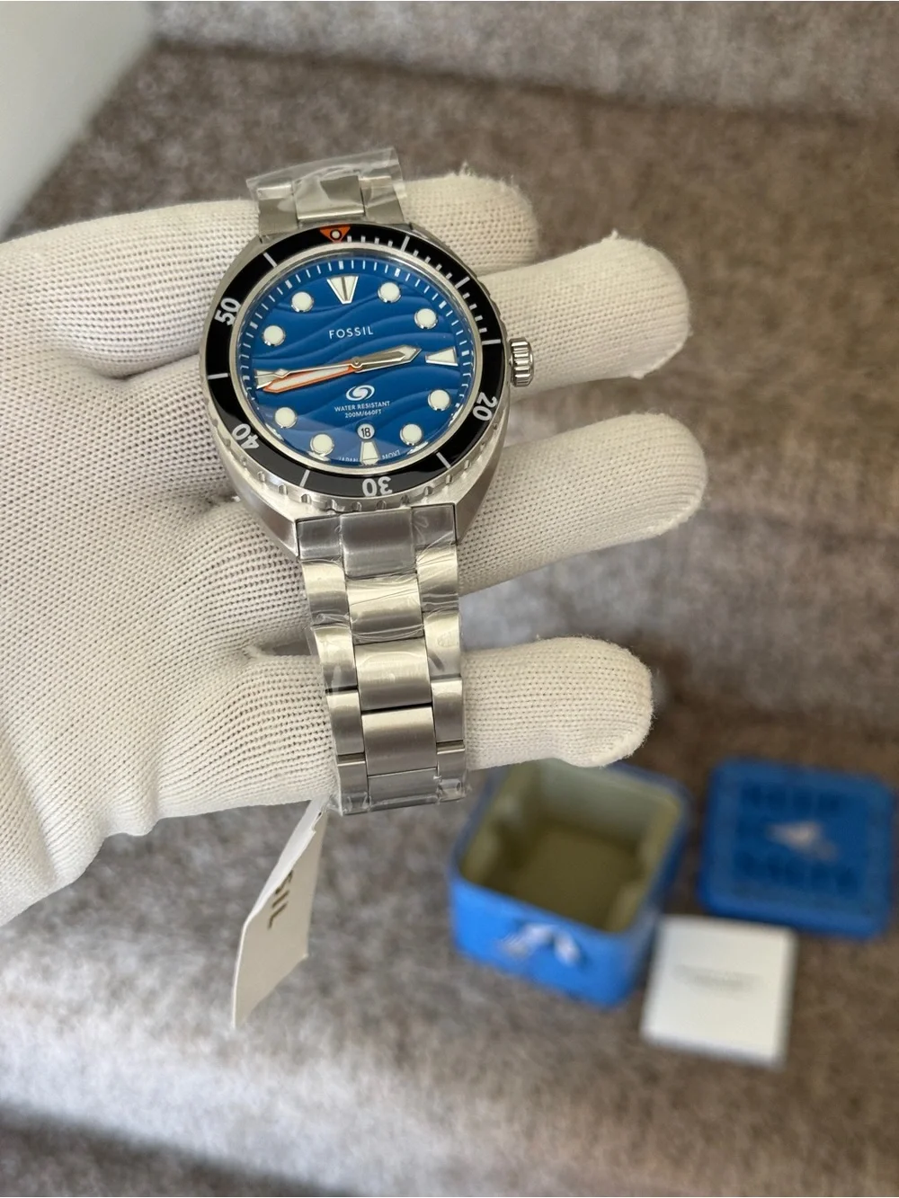 Fossil Men’s Blue Wave Dial Stainless Steel Swim Watch with Black Bezel